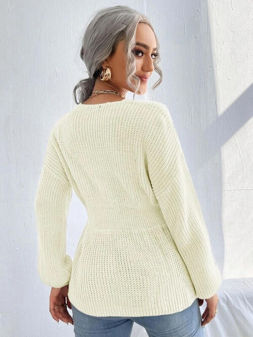 Haut en tricot à épaules tombantes crantées