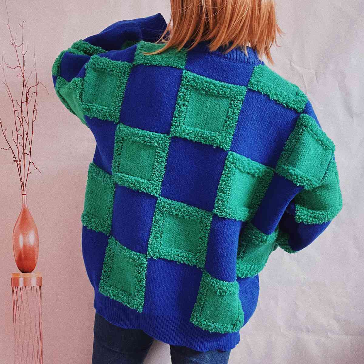 Pull à carreaux à col rond et manches longues