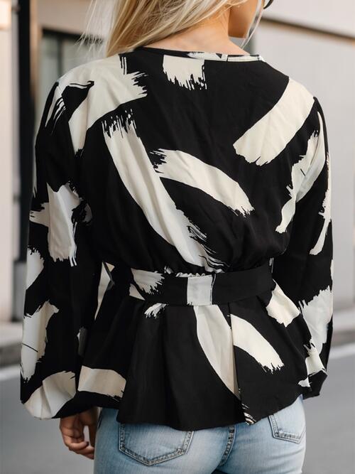 Cardigan imprimé avec détails en dentelle et lien sur le devant