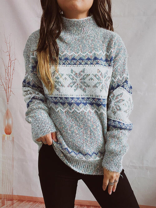 Pull géométrique à col montant et épaules tombantes