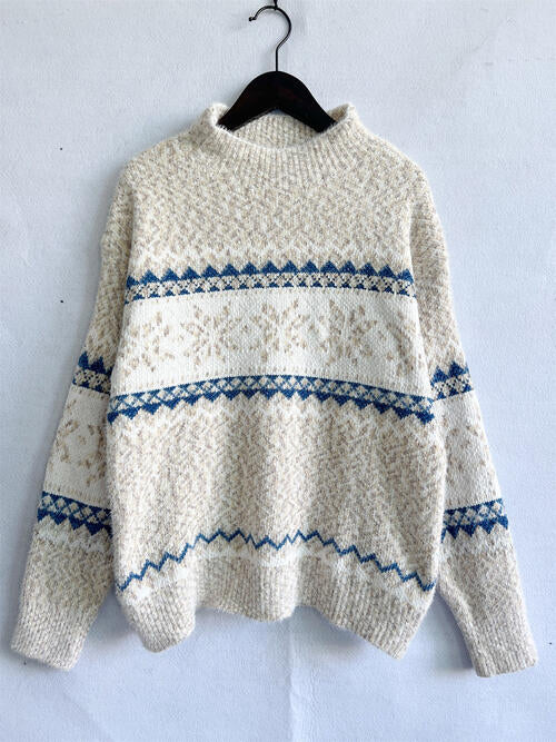 Pull géométrique à col montant et épaules tombantes