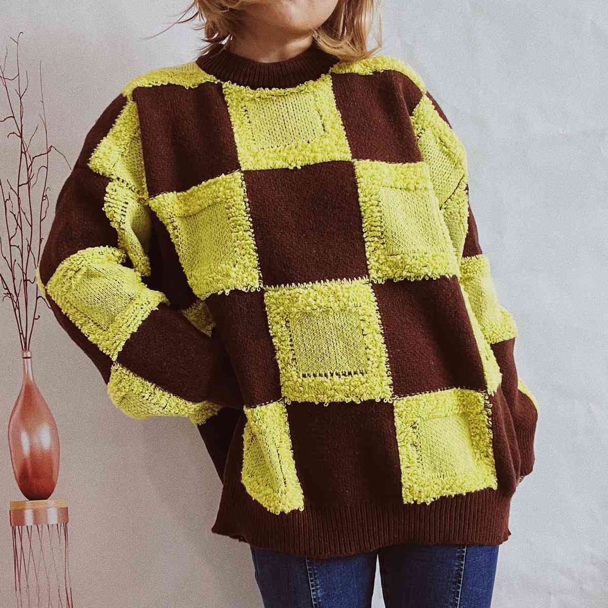 Pull à carreaux à col rond et manches longues
