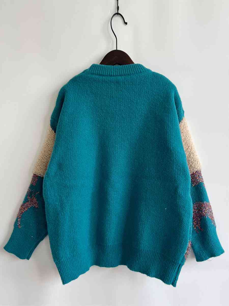 Pull col rond à paillettes motif sapin de Noël et renne