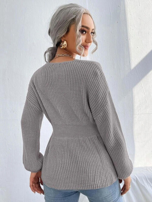 Haut en tricot à épaules tombantes crantées