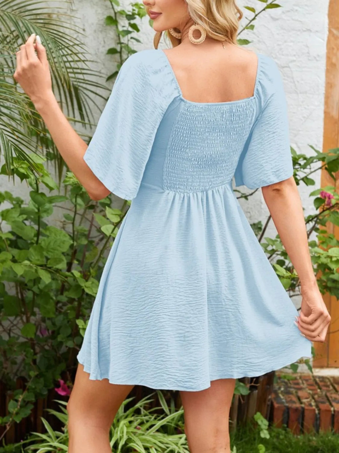 Flutter-sleeve tie dress
