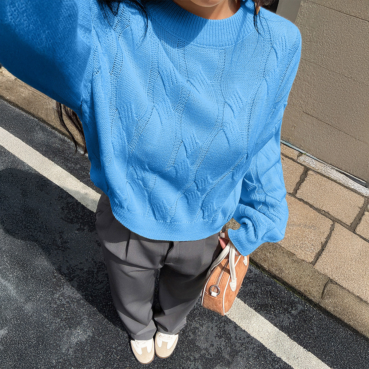 Solid color long sleeved sweater top woven with wool