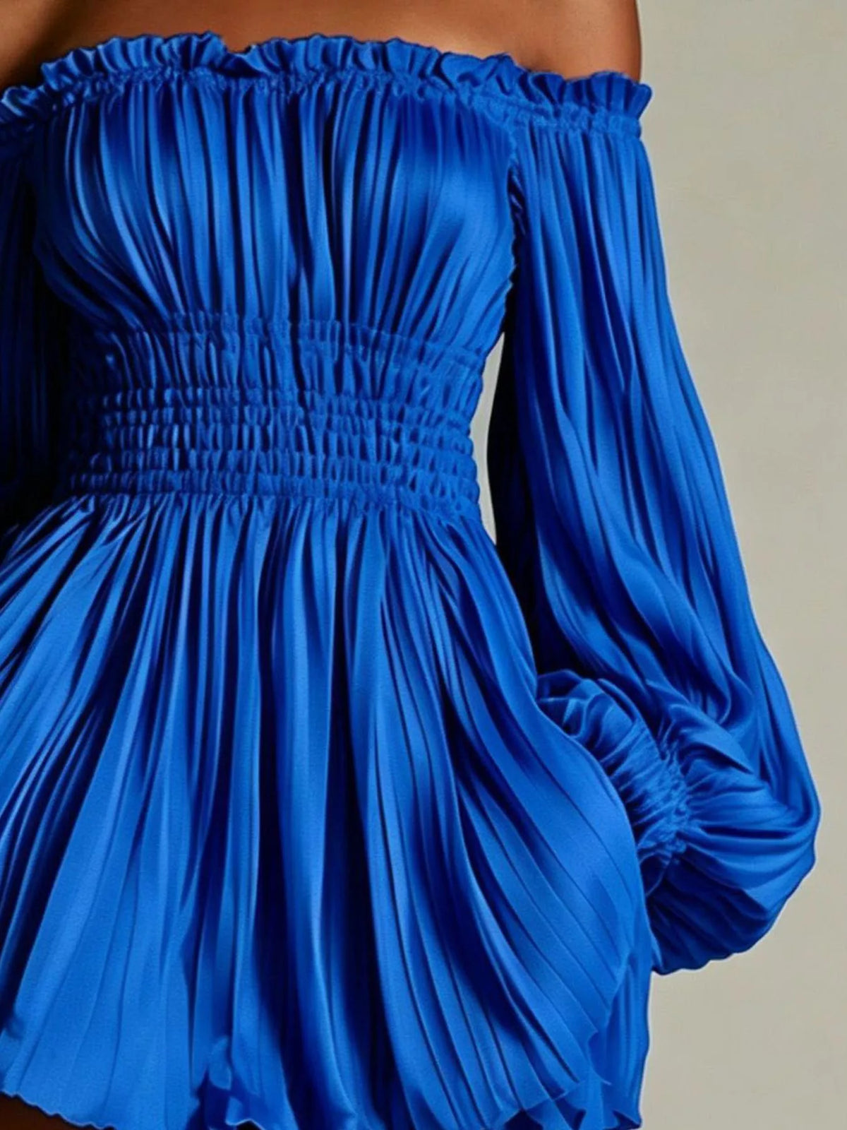 Off-shoulder pleated mini dress