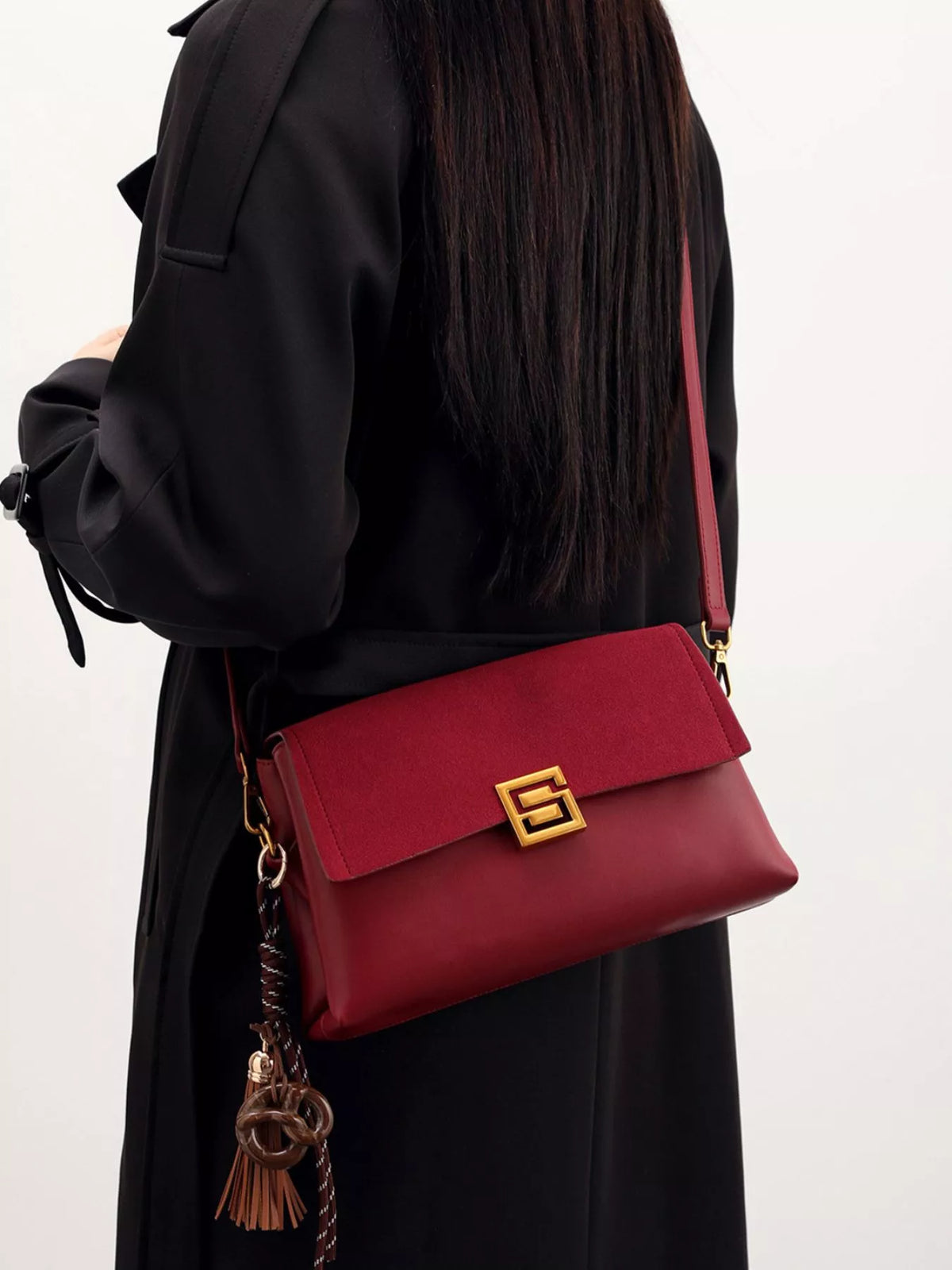 Gold-hardware crossbody bag