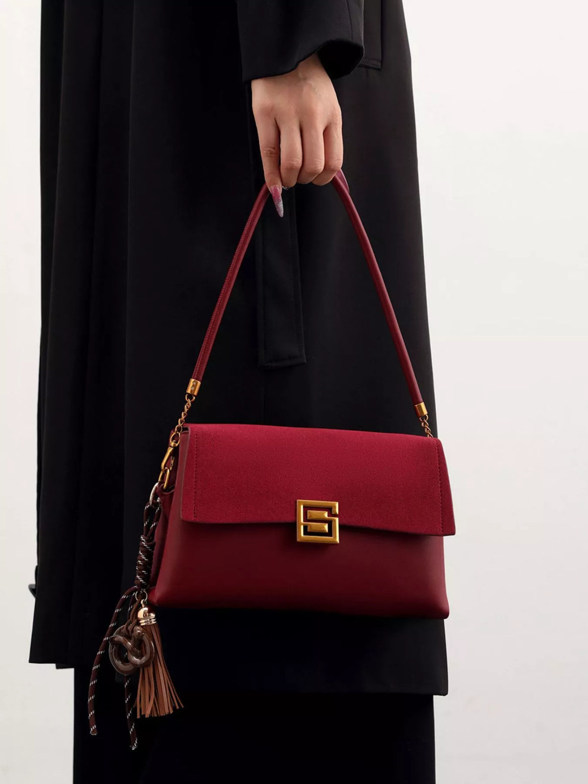 Gold-hardware crossbody bag