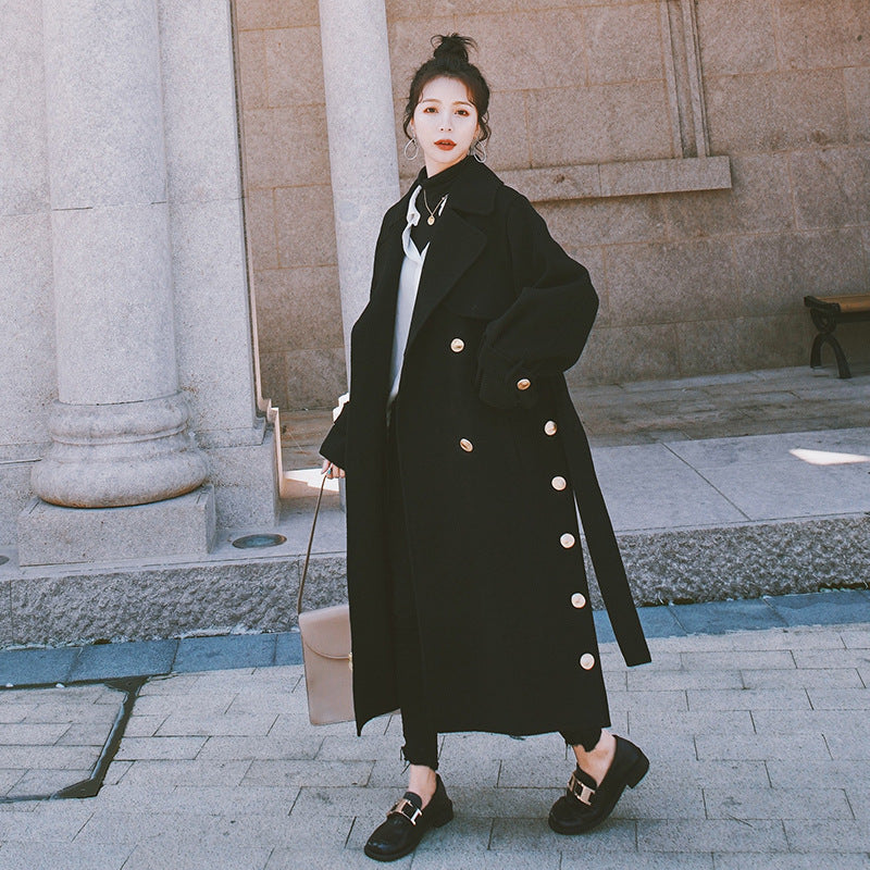 Belted black wool coat