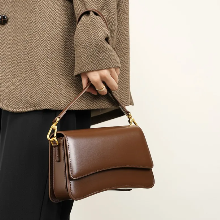 Glossed leather shoulder bag