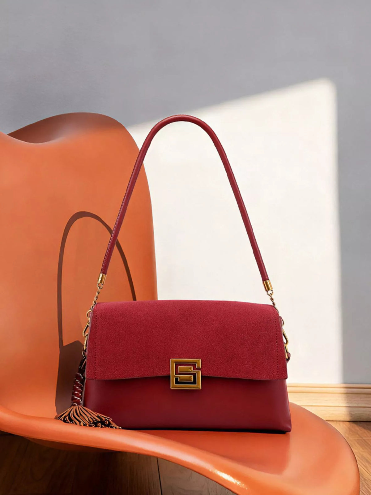 Gold-hardware crossbody bag