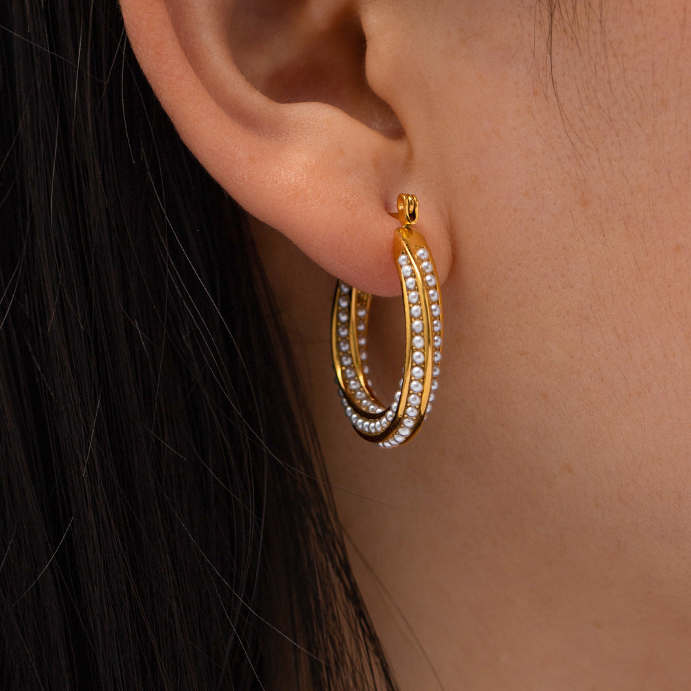 Gold pearl drop earrings