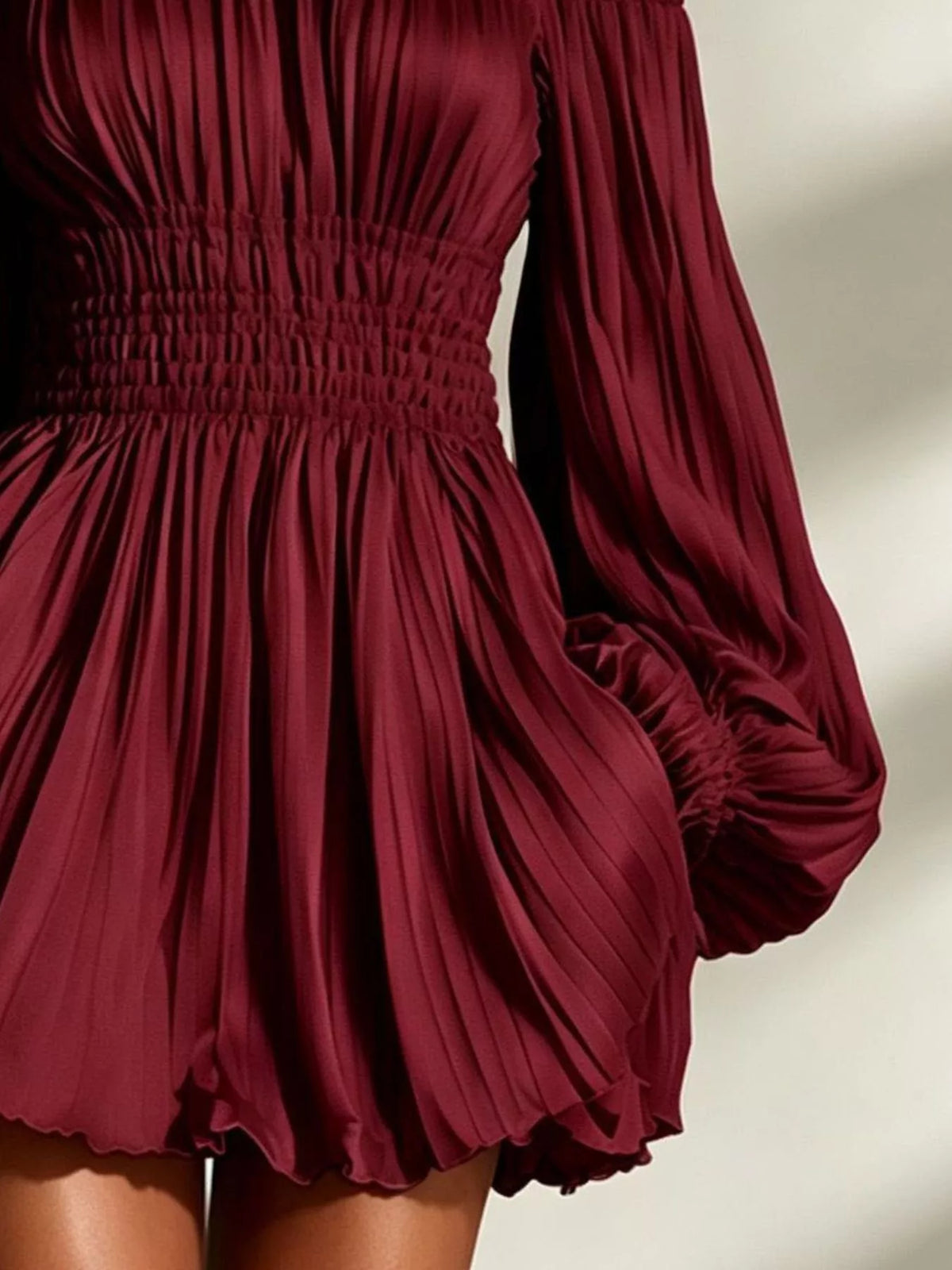 Off-shoulder pleated mini dress