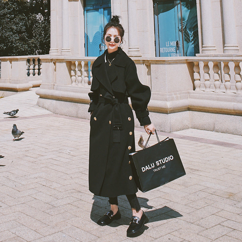 Belted black wool coat