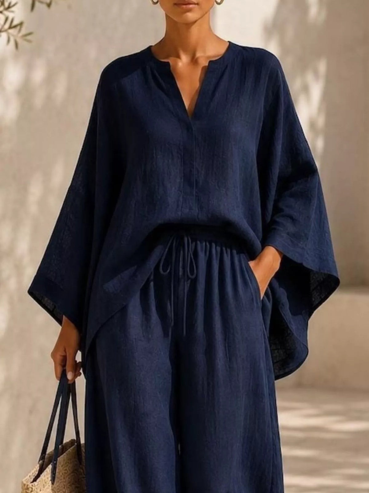 Notched long sleeve top and wide-leg pants set