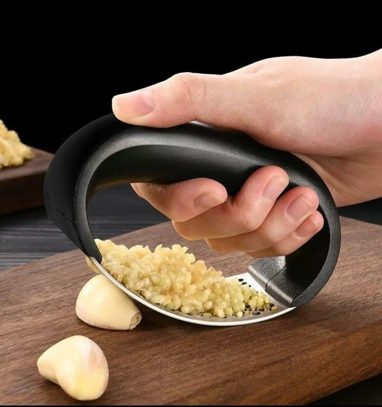 Stainless steel garlic crusher