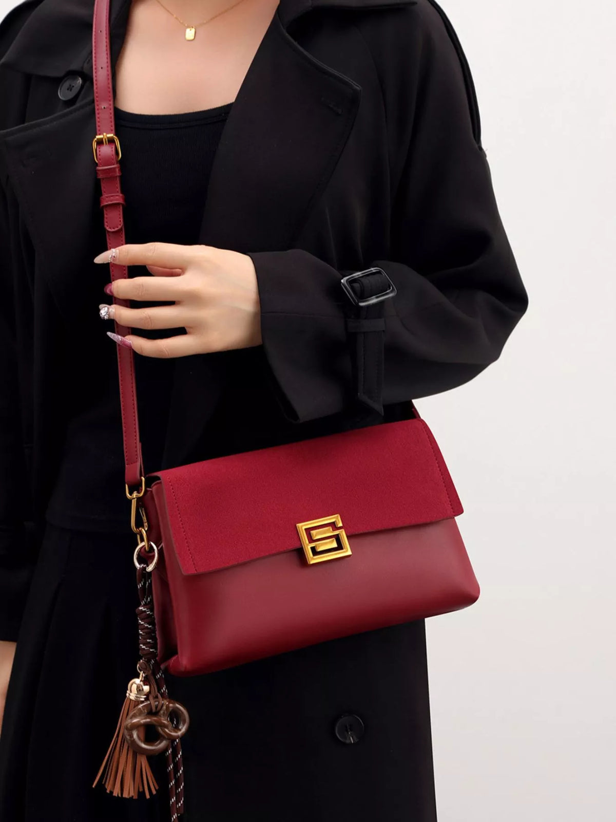 Gold-hardware crossbody bag