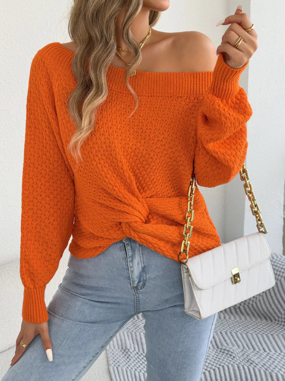 Twist front off shoulder knit