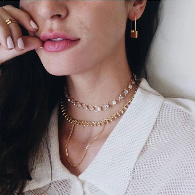 Gold lock earrings