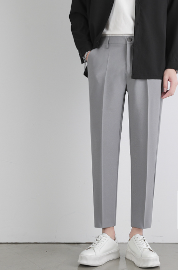 Black pleated trousers