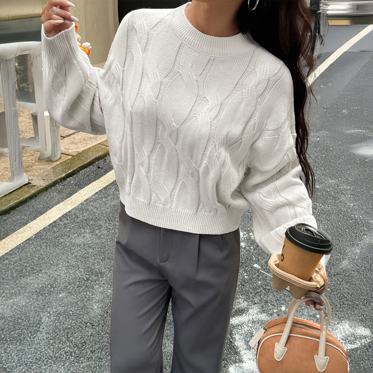 Solid color long sleeved sweater top woven with wool