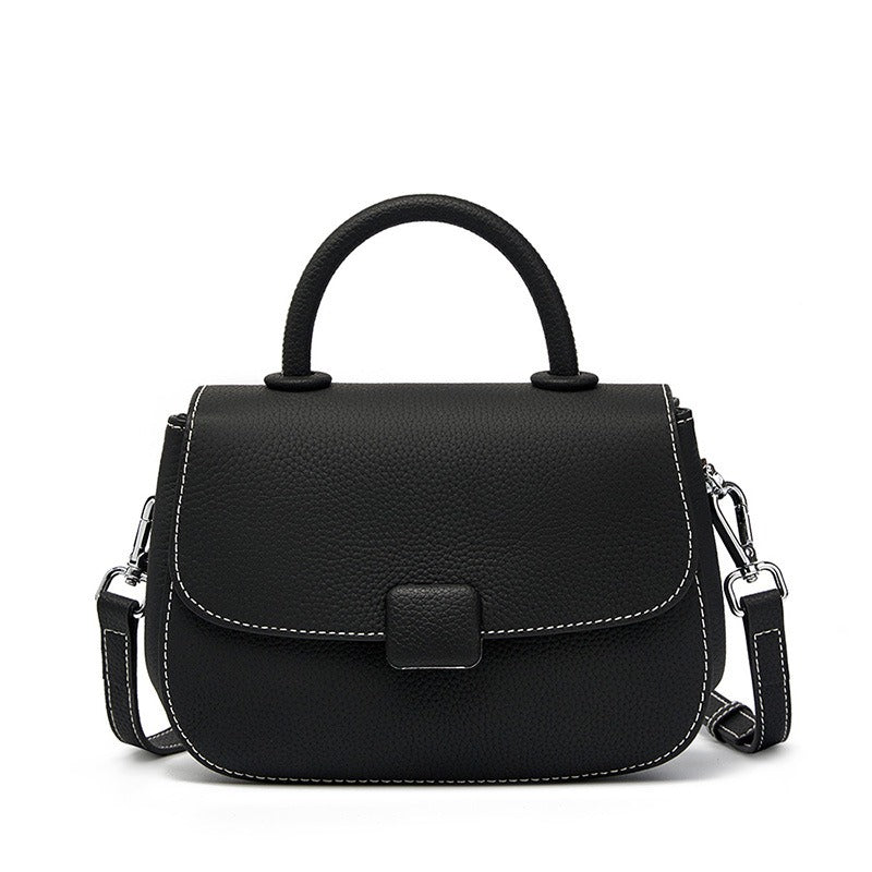 Pebbled top-handle flap bag