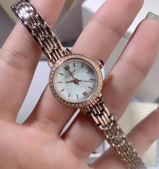 Rose gold petite watch