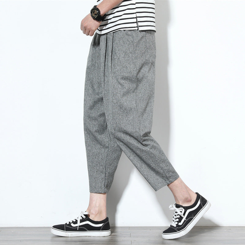 Cropped pleat-front trousers