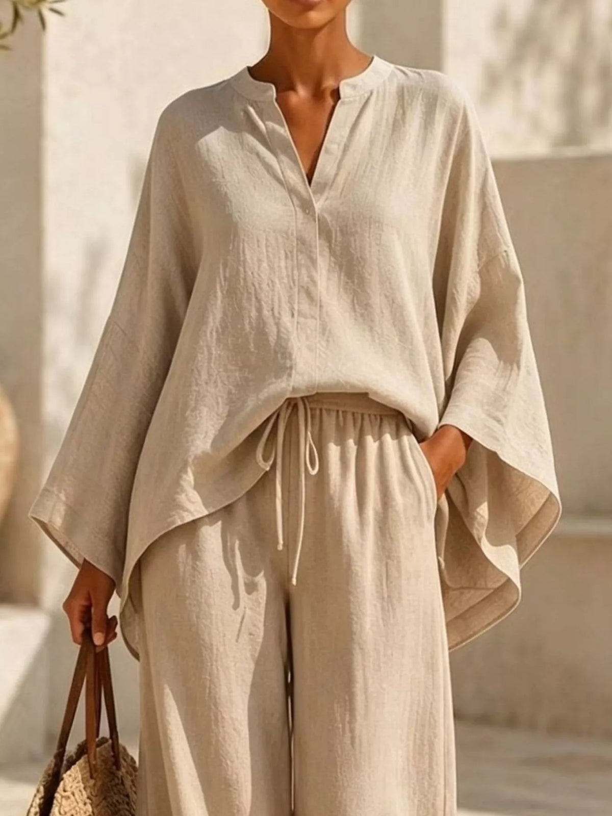 Notched long sleeve top and wide-leg pants set