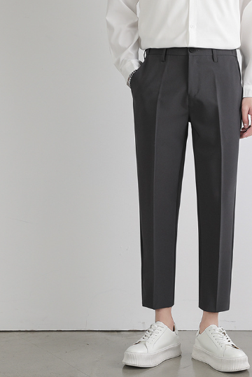 Black pleated trousers