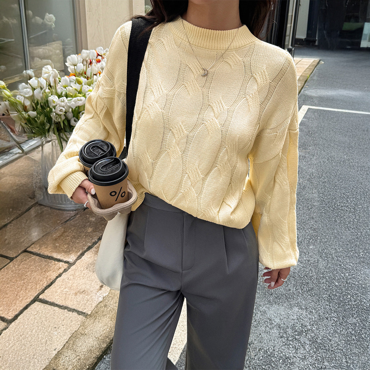 Solid color long sleeved sweater top woven with wool