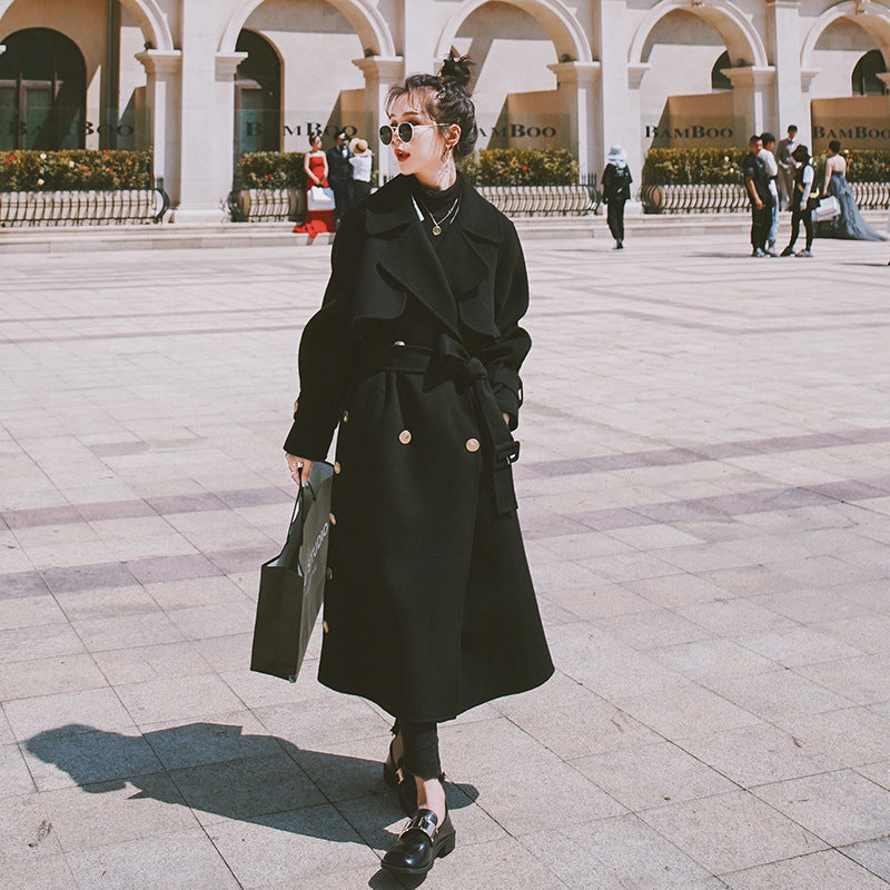 Belted black wool coat