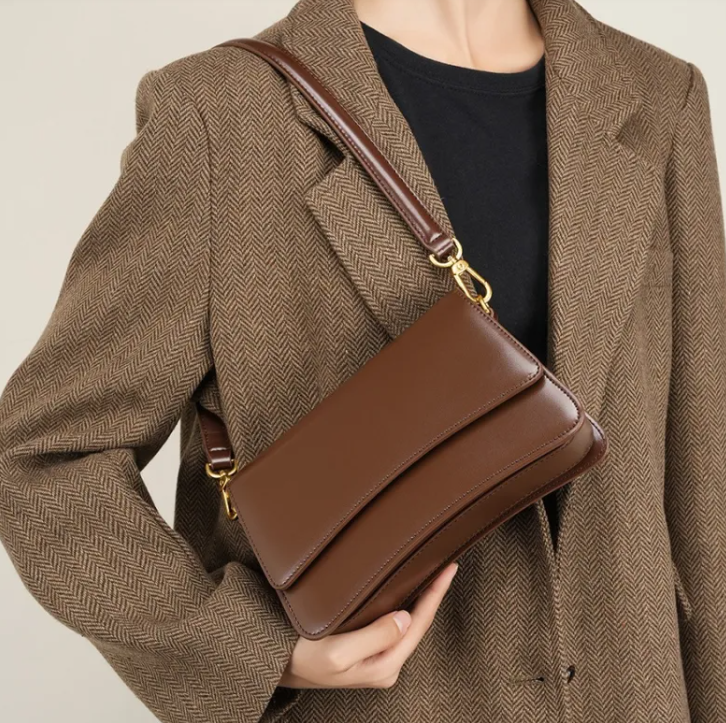 Glossed leather shoulder bag