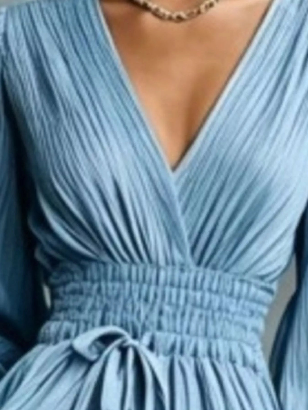 Elegant pleated V-neck maxi dress with lantern sleeves and tie-waist