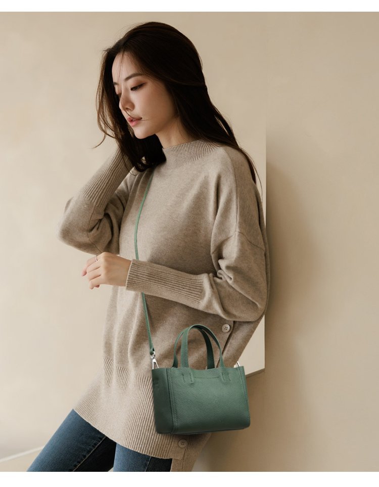 Structured leather mini tote, Forest green, worn across the body