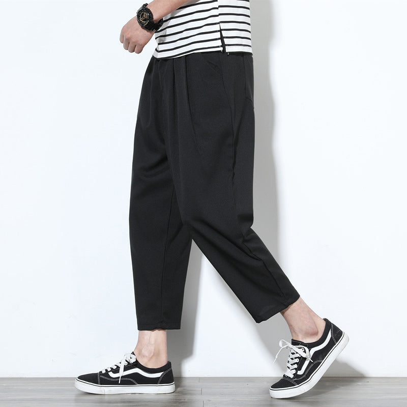 Cropped pleat front trousers