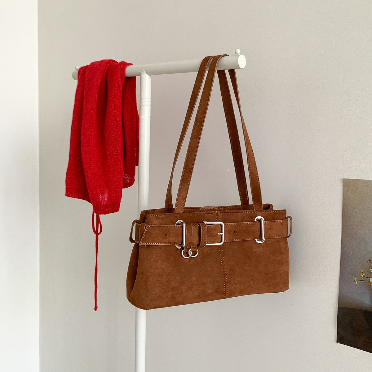 Belted baguette shoulder bag