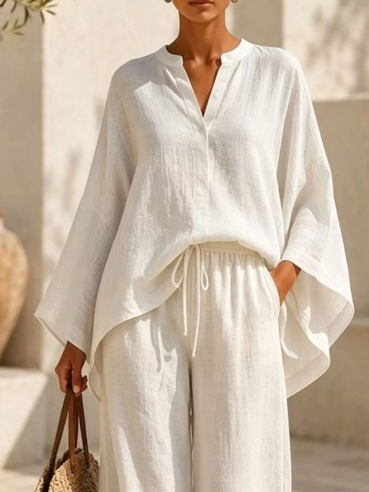 Notched long sleeve top and wide-leg pants set