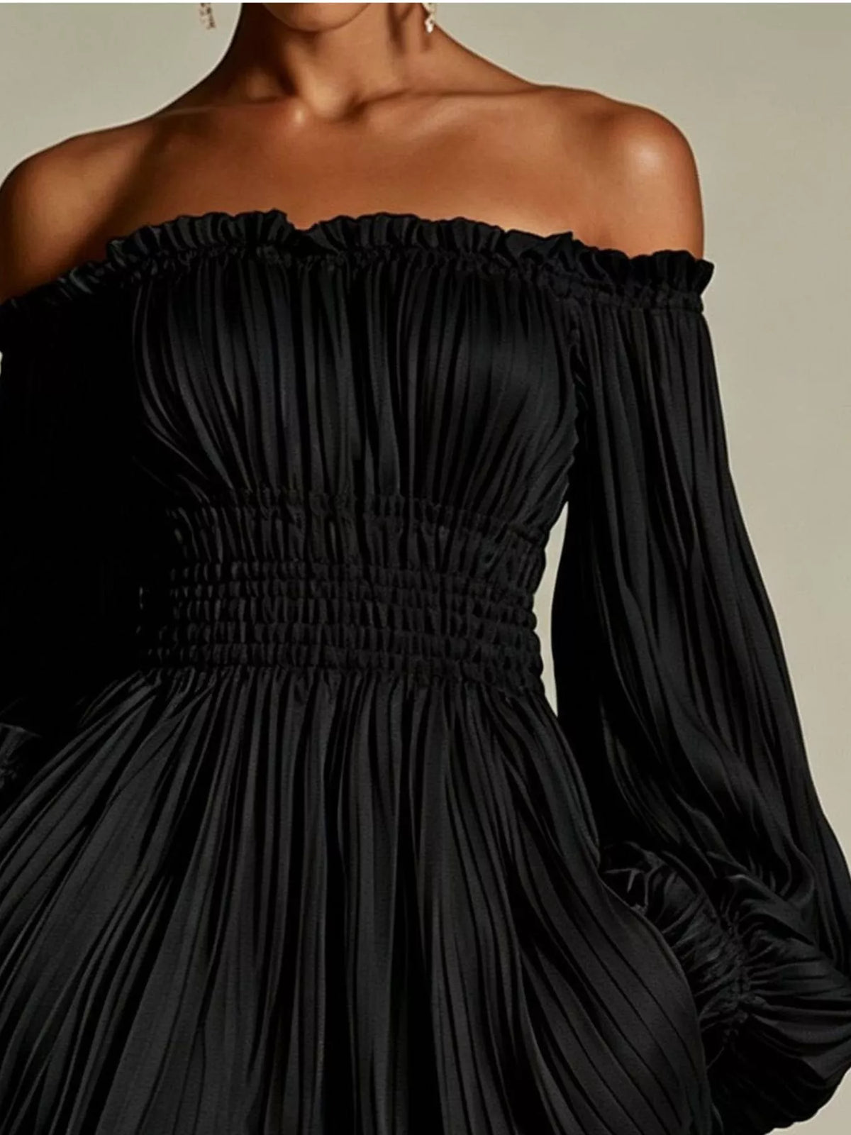 Off-shoulder pleated mini dress