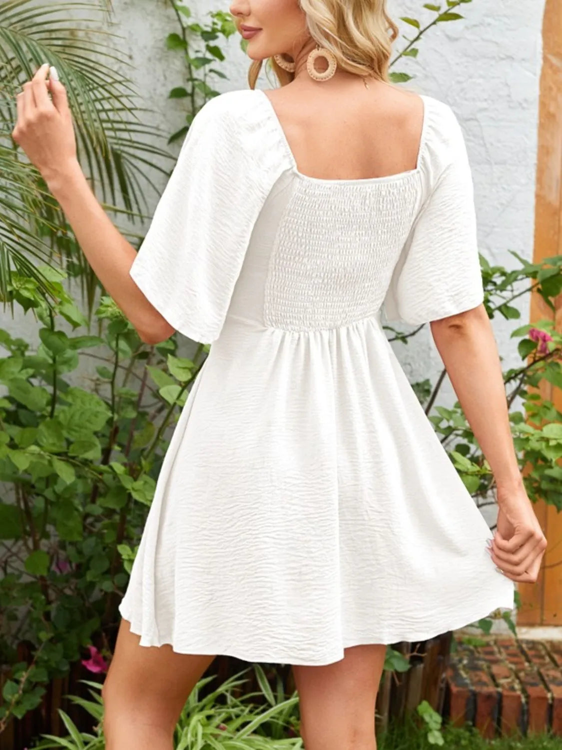 Flutter-sleeve tie dress