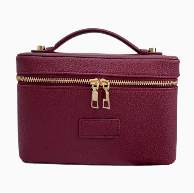 Top-handle vanity case bag