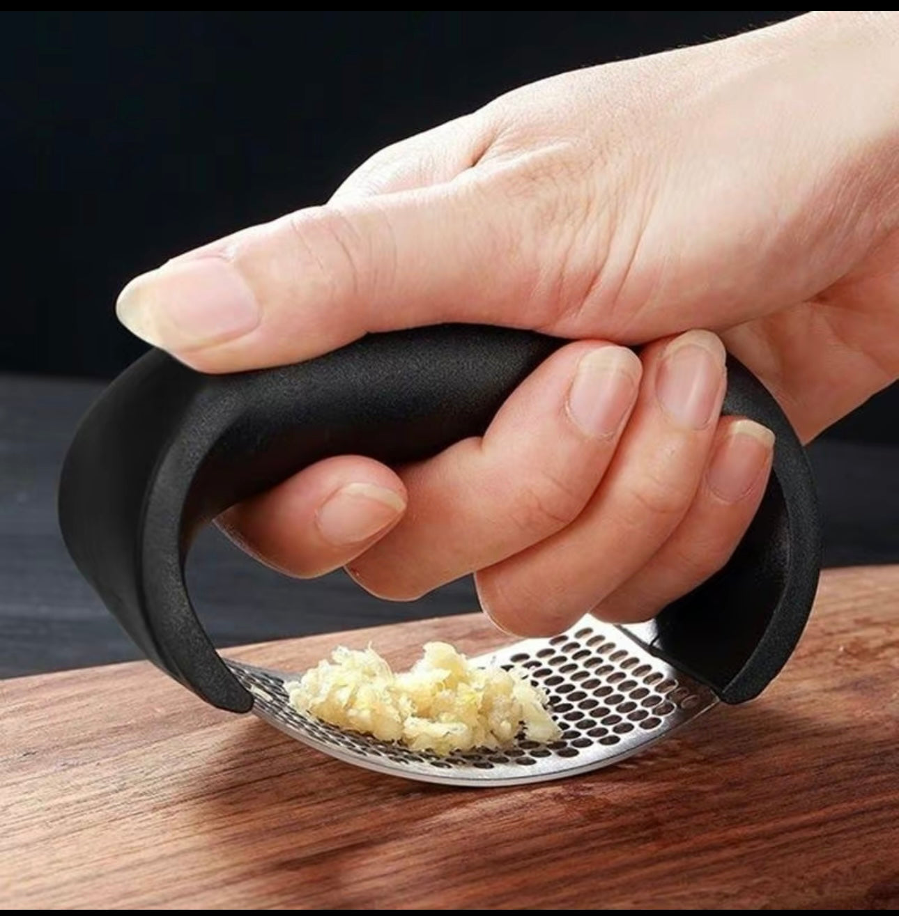 Stainless steel garlic crusher