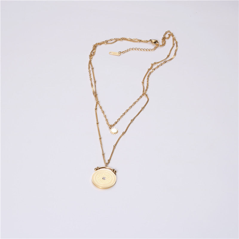 Gold coin layered necklace
