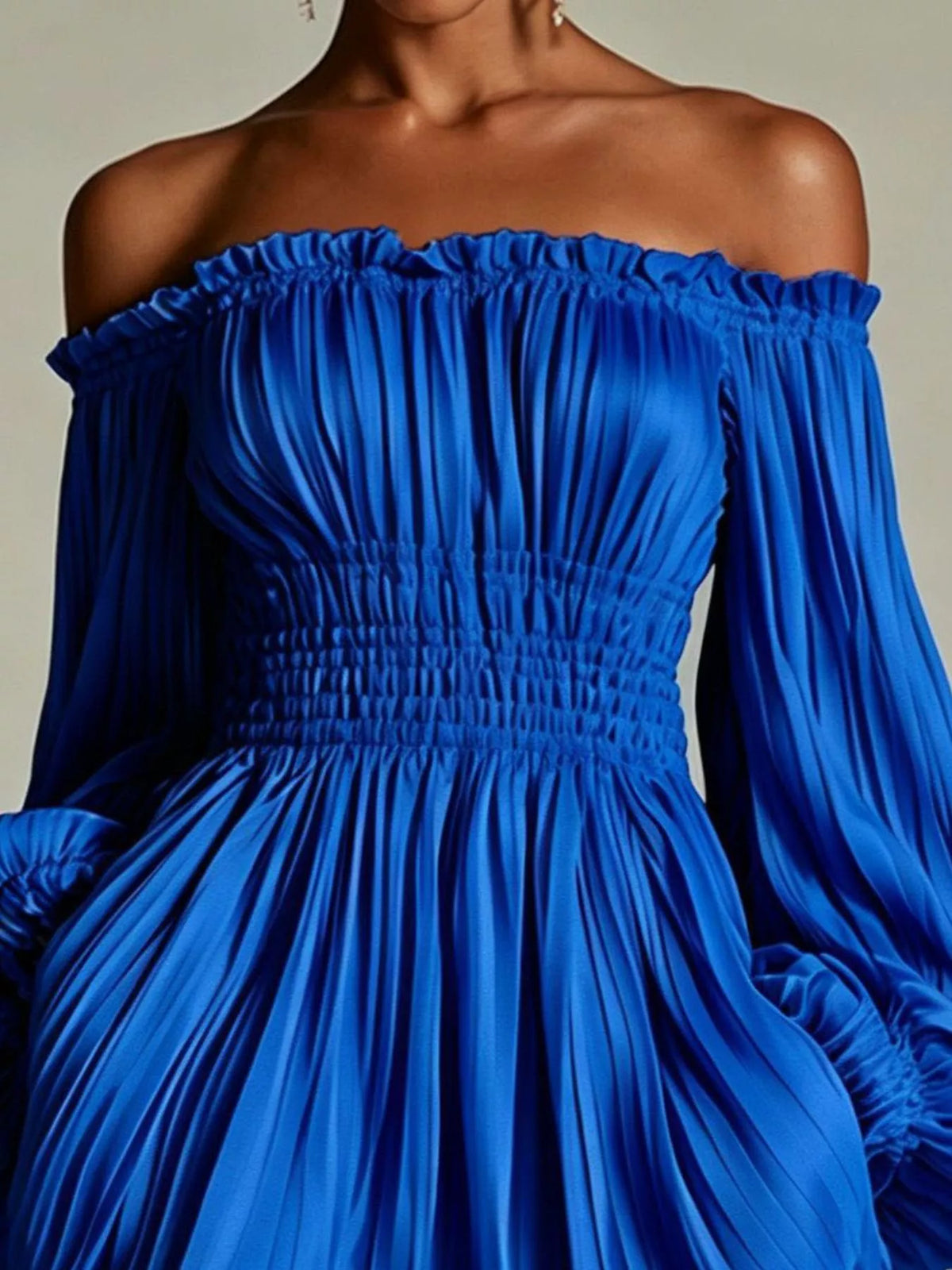 Off-shoulder pleated mini dress