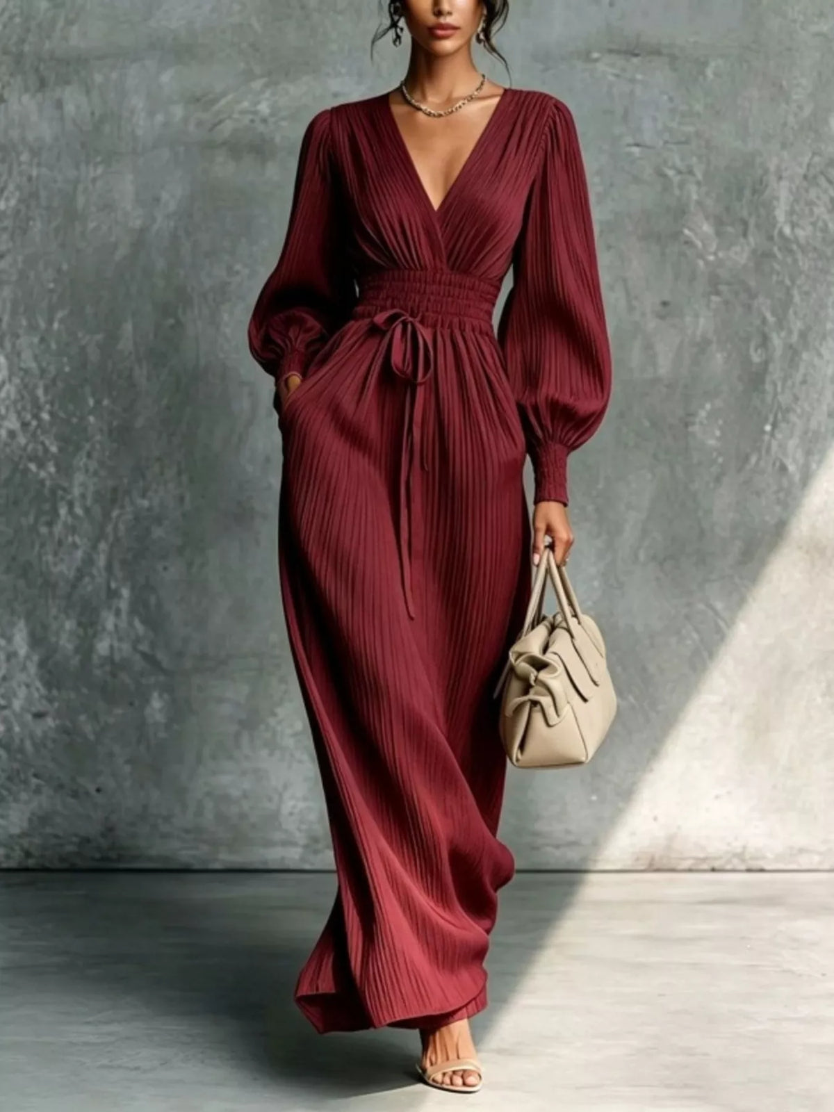 Elegant pleated V-neck maxi dress with lantern sleeves and tie-waist