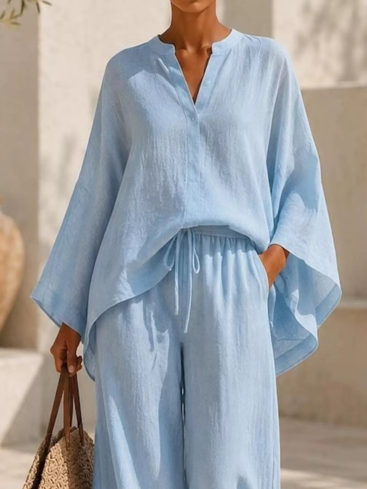Notched long sleeve top and wide-leg pants set