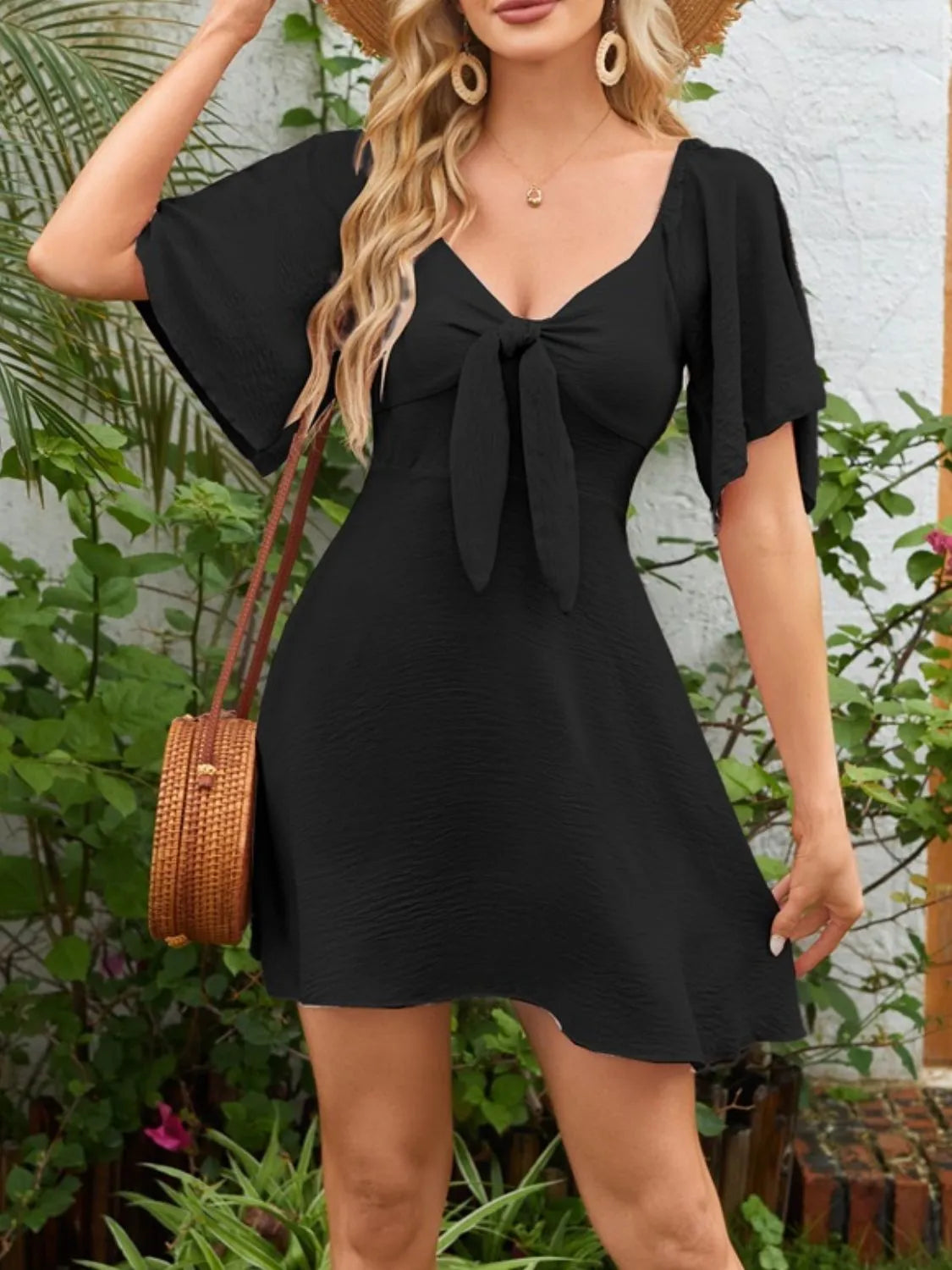 Flutter-sleeve tie dress