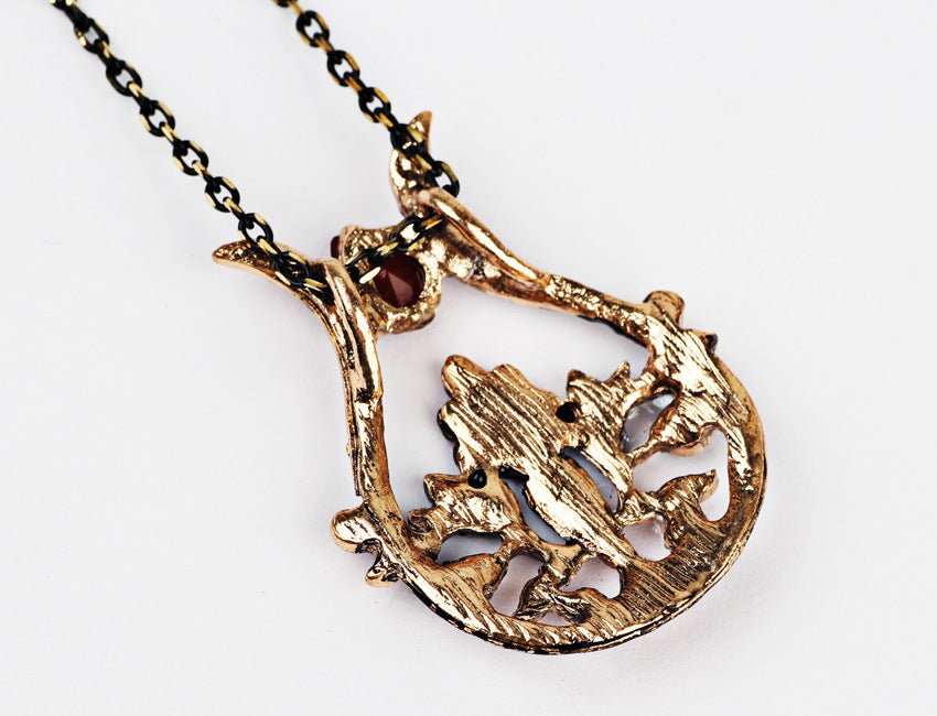 Gold pendant necklace and earring set
