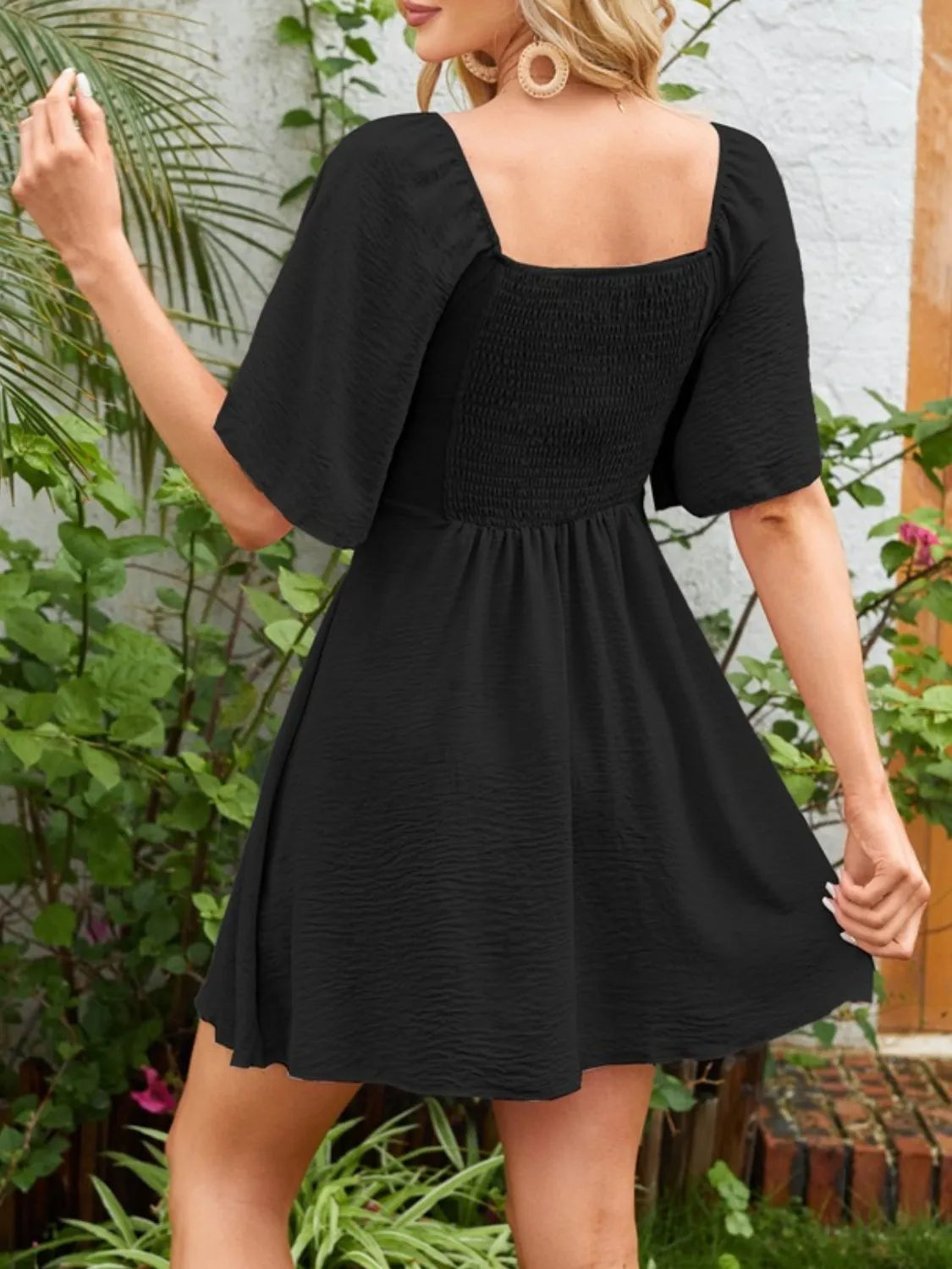 Flutter-sleeve tie dress